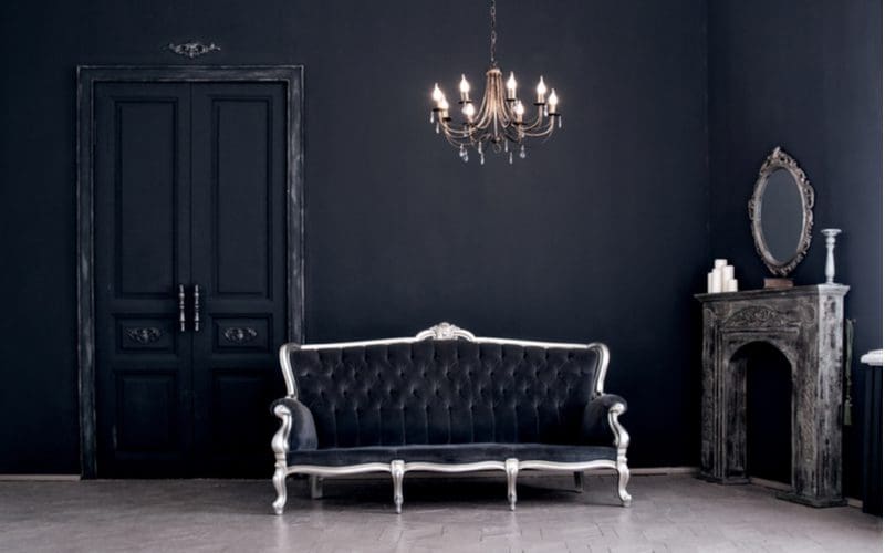 Gothic bedroom idea with black furniture