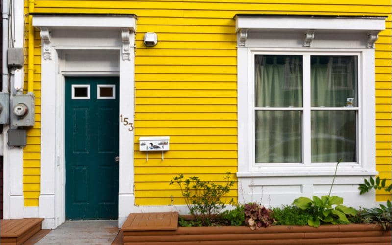 Forest Green, one of the best front door colors for yellow houses
