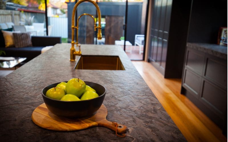 Gold and Wood and Dark All Over Black Countertop Idea