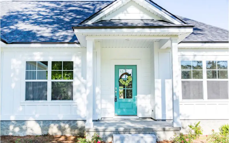 Turquoise, one of the best front door colors for white houses