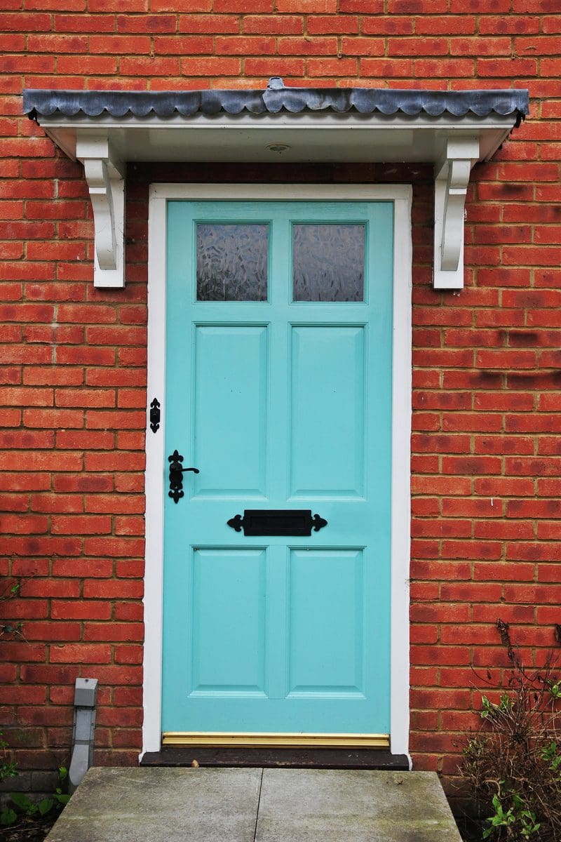 Turquoise Front Door color on a brown house