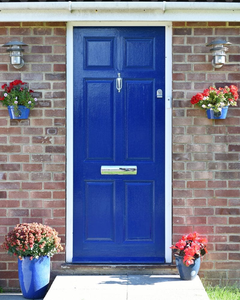 Bright Blue Front Door Color on a Brown House
