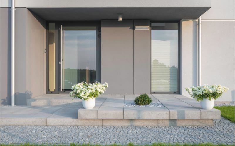 Very unique glass front door idea in a villa-style home