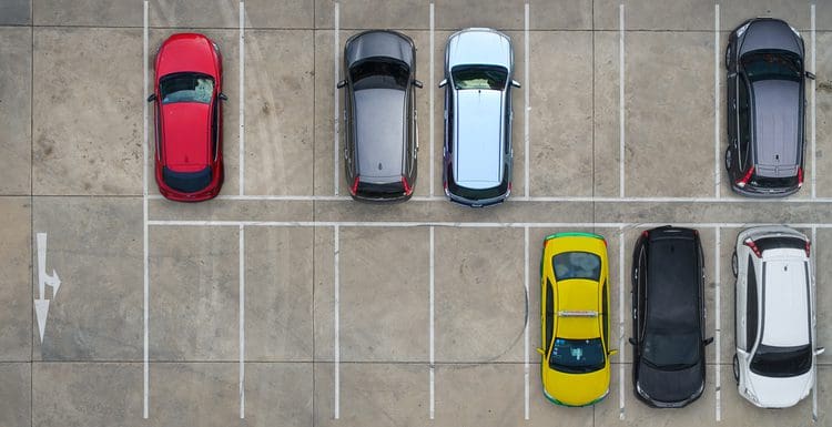 Average parking space dimensions painted in a lot