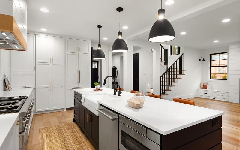 Lights over island can act as a central point in a modern kitchen