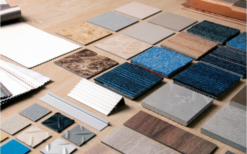 Image of the best wall and floor color combinations laid out on a designer's desk