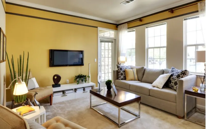 What color curtains for yellow walls image showing a room with sheer white curtains