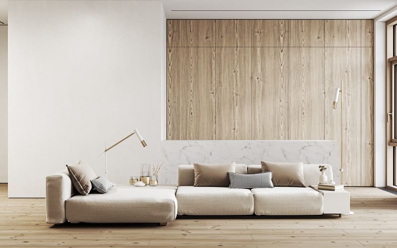 Off-white and ivory design livng room matched with wood paneling on the walls