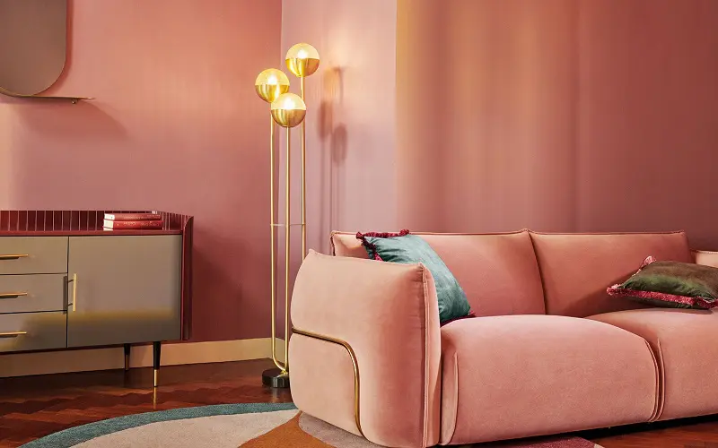 Peach and gold shades will transform even the dreariest, low-light rooms into a welcoming oasis