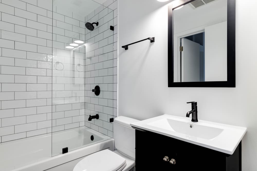 Small modern black and white bathroom for a piece on the average bathroom size