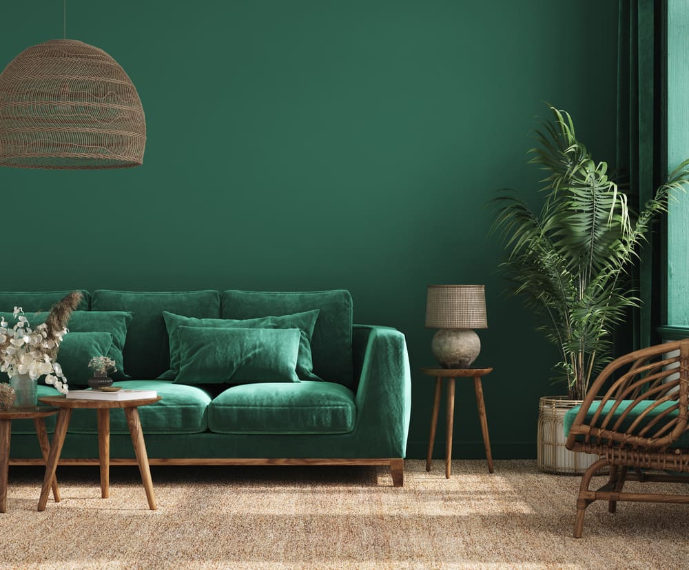 Living room with natural wood accents and floors for a piece on colors that do with dark green