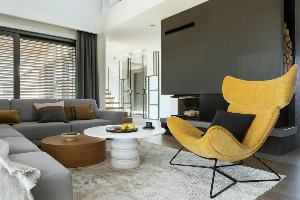 Neat modern style chair with dark grey walls for a piece on colors that go with mustard yellow