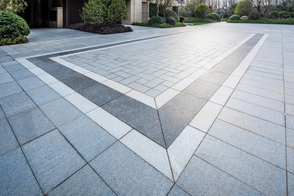 Grey marble floor for a piece on the best types of pavers for a home or landscaping