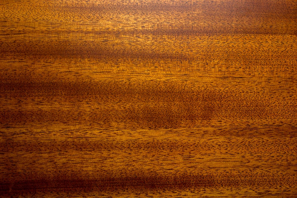 Birds-eye image of mahogany, one of the several types of wood grain patterns, pictured from above