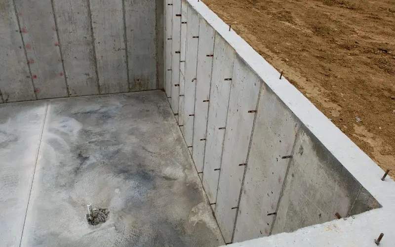 Concrete slab and walls of basement