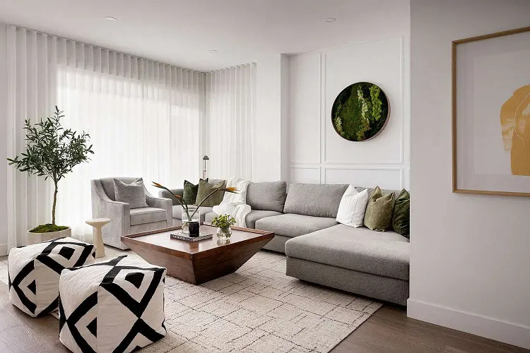 White shades with gray sofa